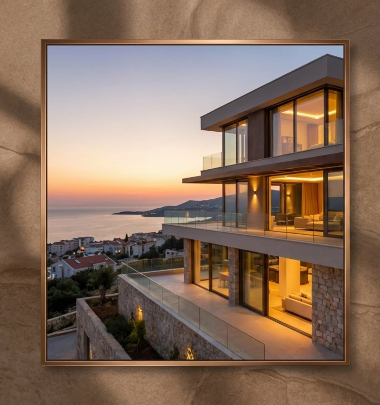 A modern luxury villa at sunset overlooking the Mediterranean